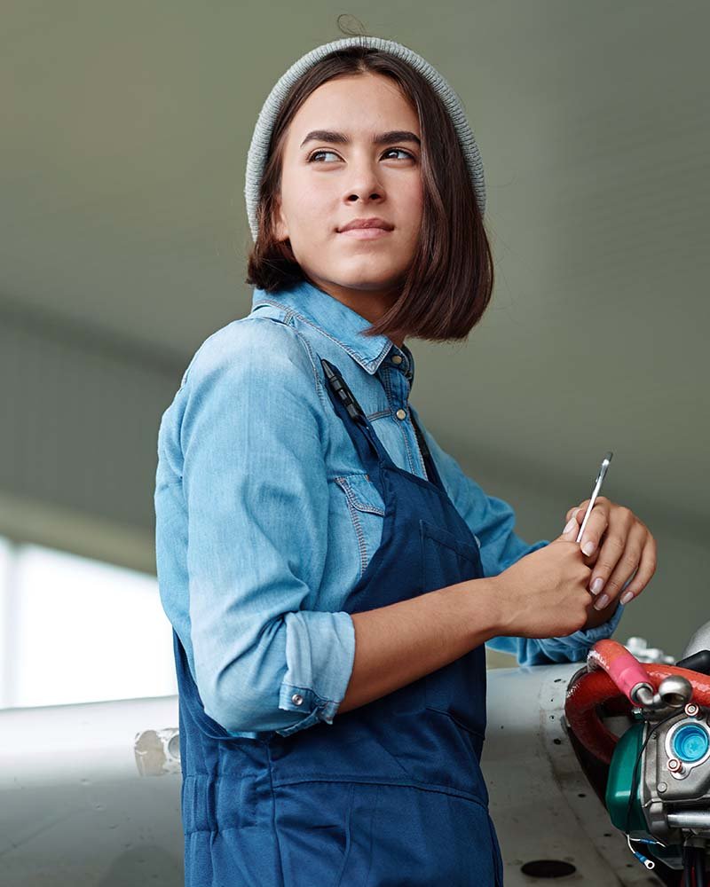Mechanic servicing a bike at Machnify Garage, Warje Pune